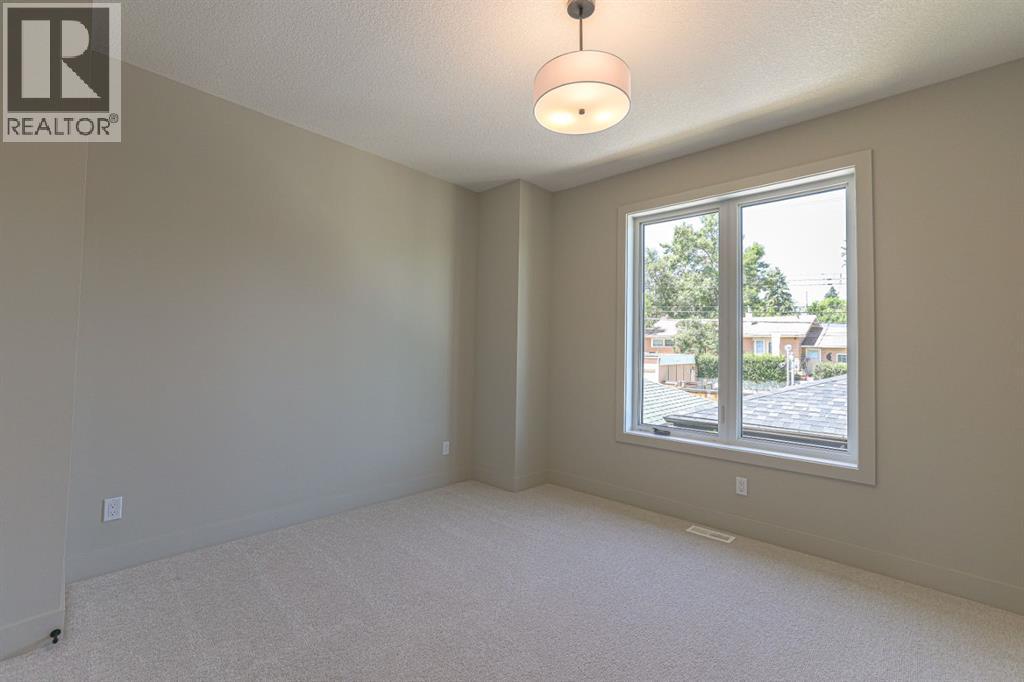 147 Heston Street Nw, Calgary, Alberta  T2K 2C5 - Photo 38 - A2329022