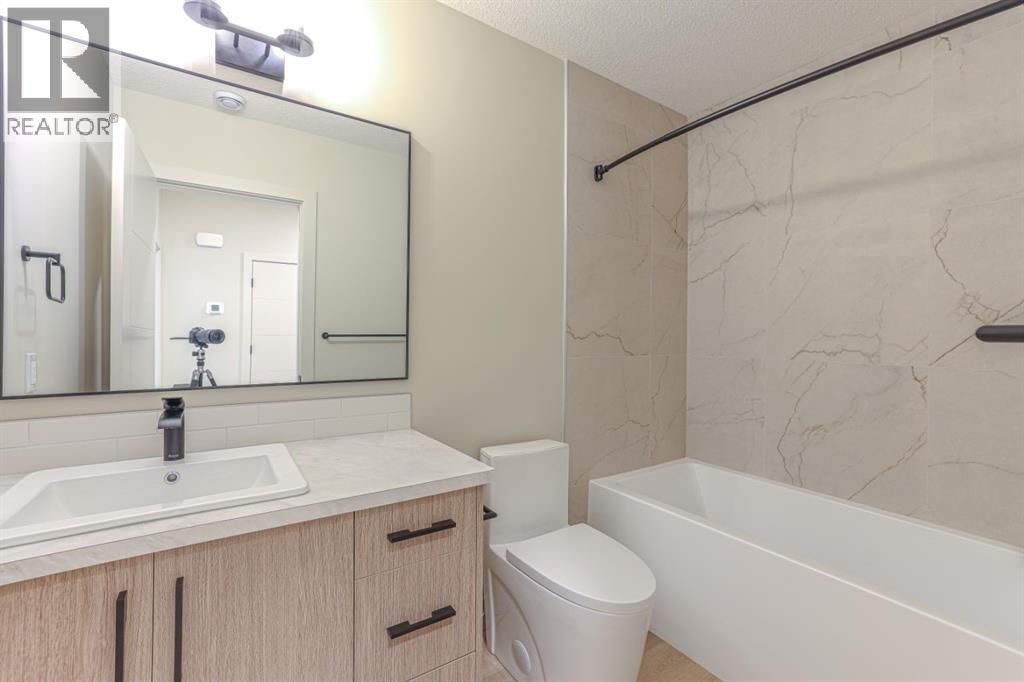 147 Heston Street Nw, Calgary, Alberta  T2K 2C5 - Photo 40 - A2329022