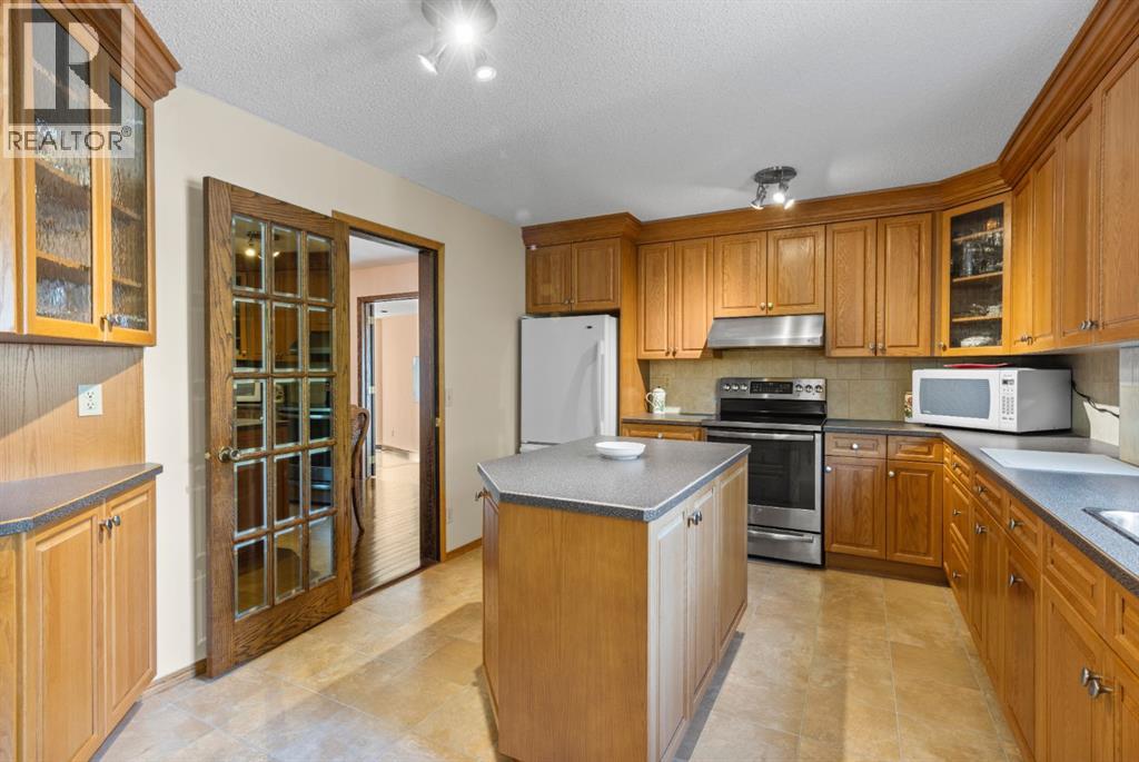 203 Silver Valley Boulevard NW, Calgary, Alberta  T3B 4B7 - Photo 12 - A2333835