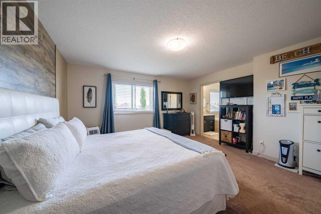 144 Everhollow Street SW, Calgary, Alberta  T2Y 0B1 - Photo 10 - A2329854