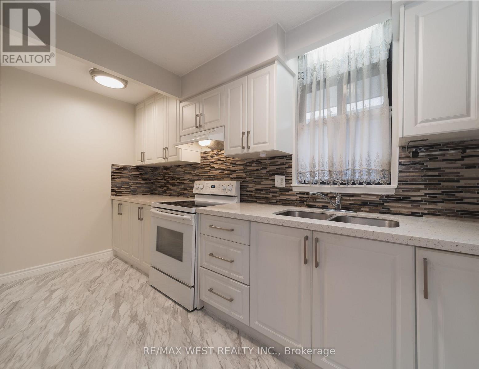 1-202 - 50 Old Kingston Road, Toronto, Ontario  M1E 4Y1 - Photo 2 - E13479136