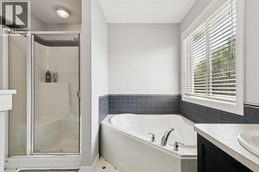 105 Bridlerange Place SW, Calgary, Alberta  T2Y 0K8 - Photo 21 - A2333414
