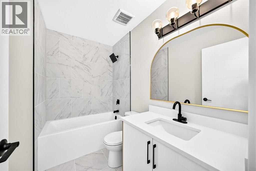704 Malvern Drive NE, Calgary, Alberta  T2A 6B7 - Photo 25 - A2334398