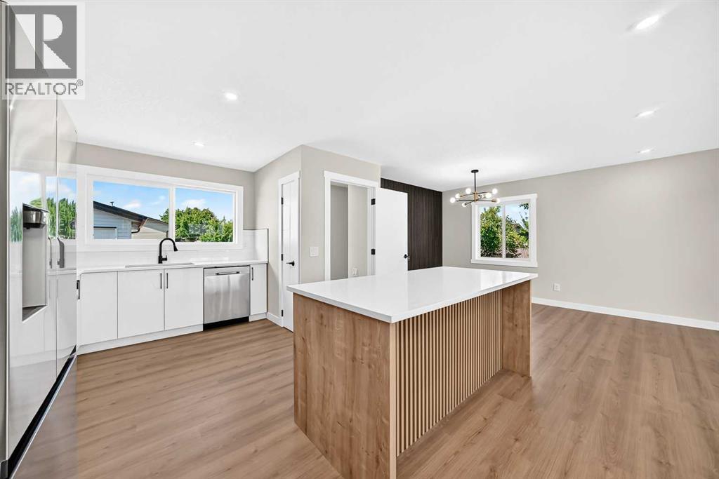 704 Malvern Drive NE, Calgary, Alberta  T2A 6B7 - Photo 5 - A2334398