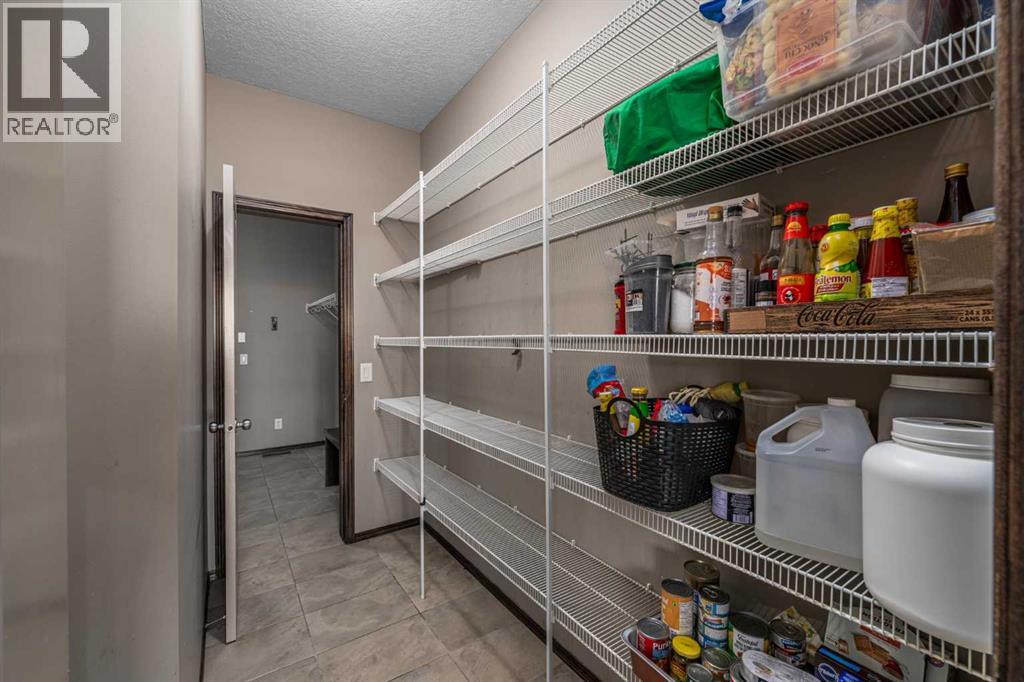 173 Pantego Road NW, Calgary, Alberta  T3K 0B8 - Photo 12 - A2334399