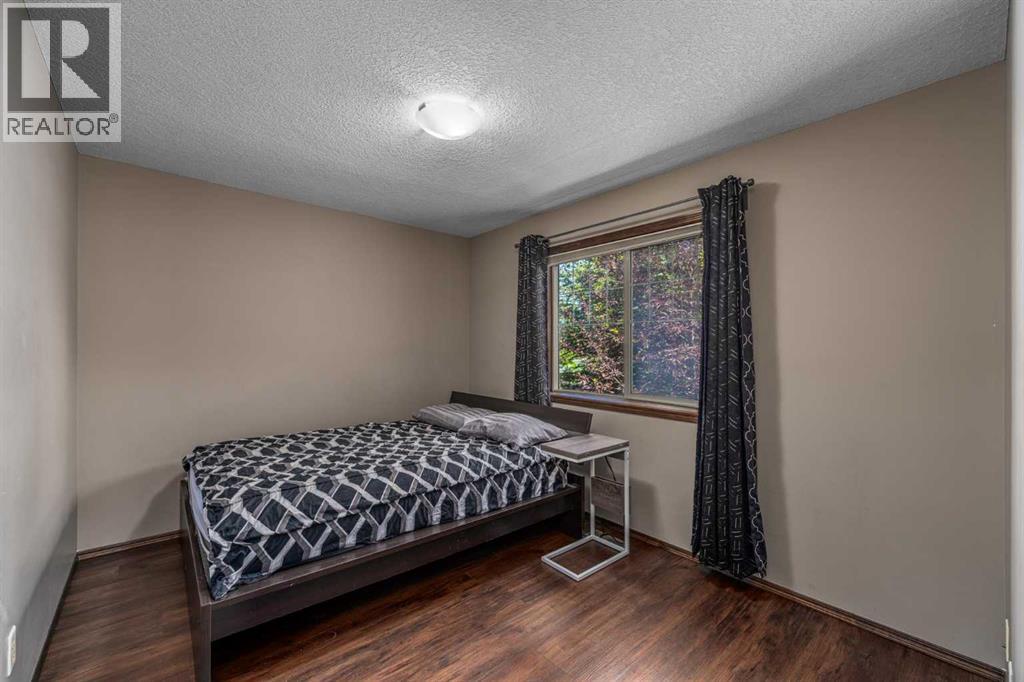 173 Pantego Road NW, Calgary, Alberta  T3K 0B8 - Photo 23 - A2334399