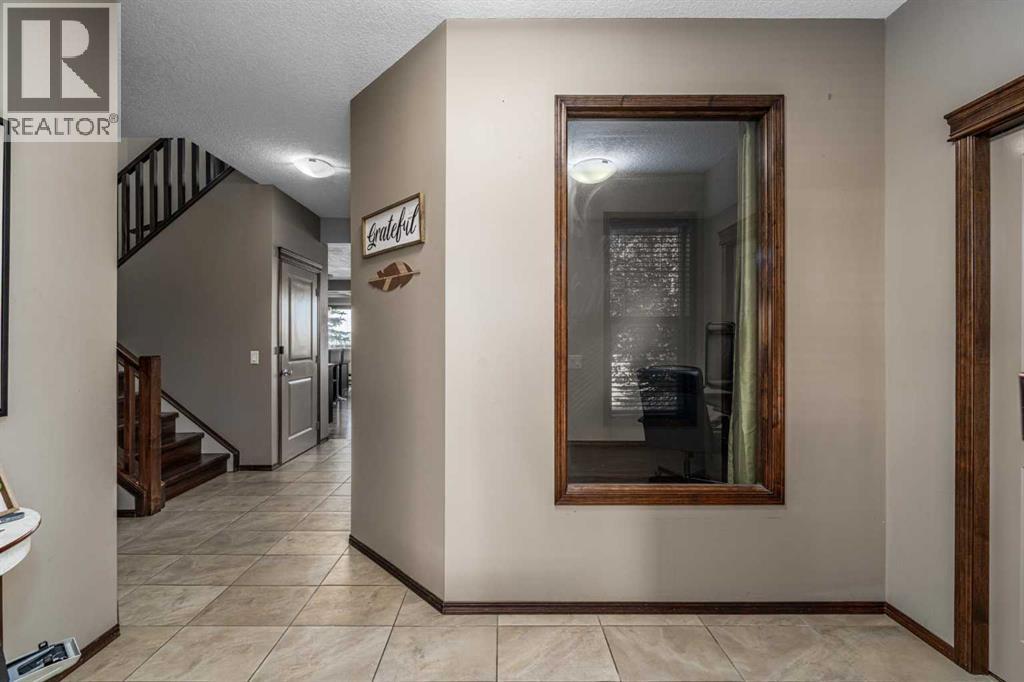 173 Pantego Road NW, Calgary, Alberta  T3K 0B8 - Photo 3 - A2334399