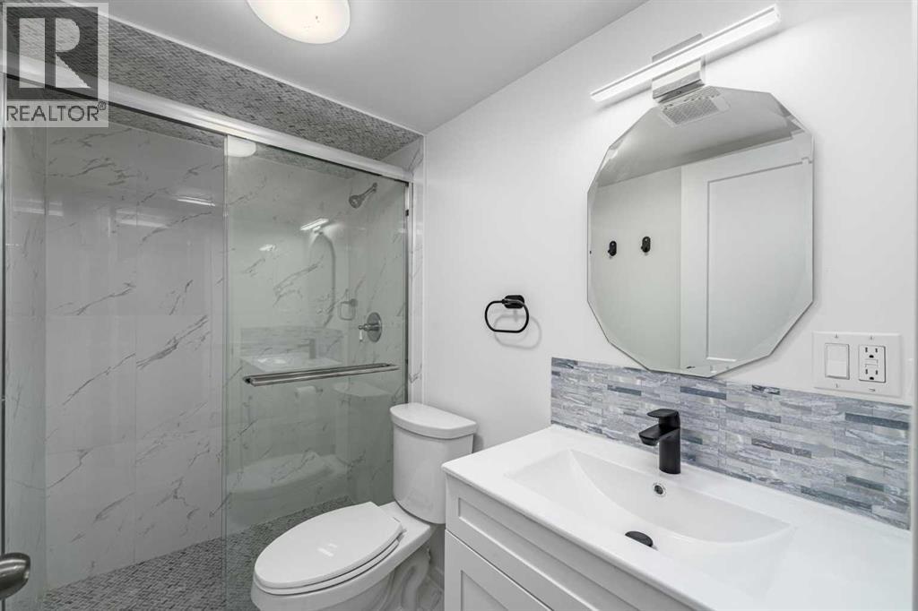 173 Pantego Road NW, Calgary, Alberta  T3K 0B8 - Photo 33 - A2334399