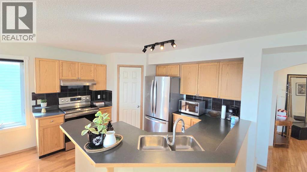 210 Panamount Hill NW, Calgary, Alberta  T3K 5P5 - Photo 10 - A2330714