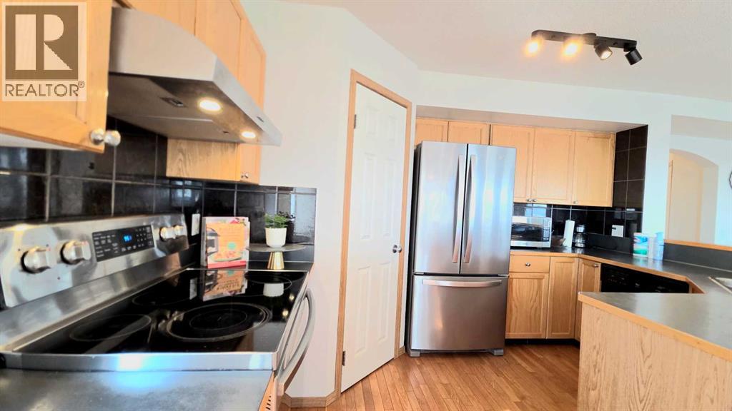 210 Panamount Hill NW, Calgary, Alberta  T3K 5P5 - Photo 11 - A2330714