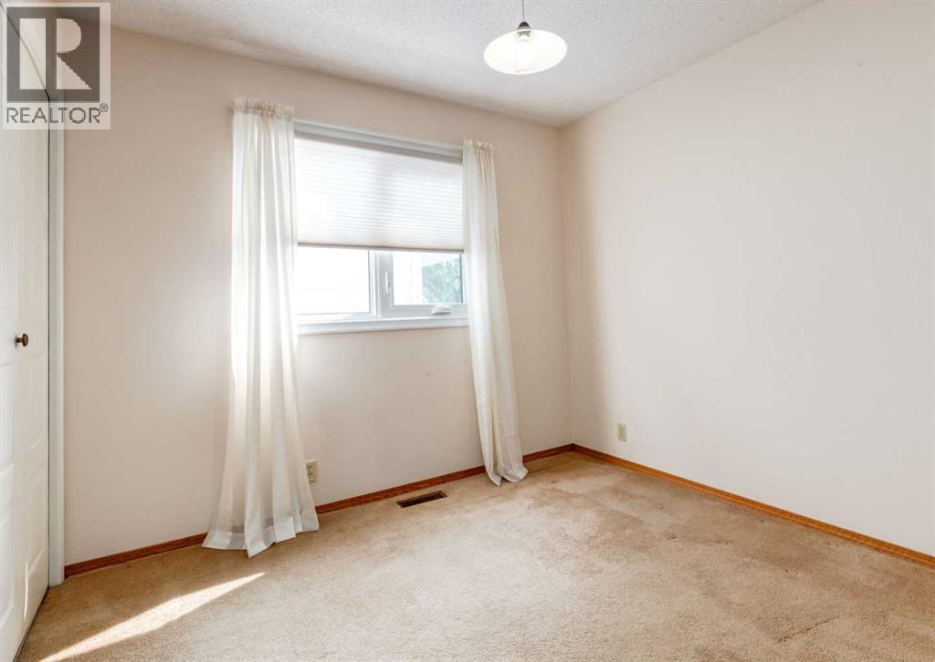 7919 Silver Springs Road NW, Calgary, Alberta  T3B 4K4 - Photo 23 - A2333967