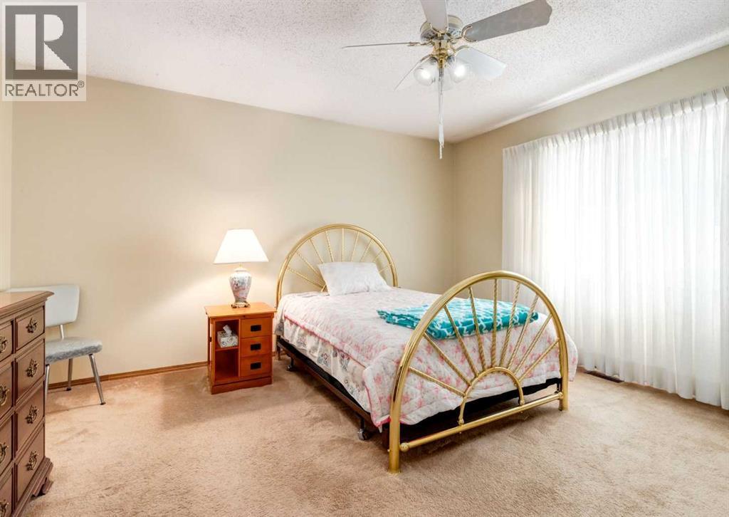 7919 Silver Springs Road NW, Calgary, Alberta  T3B 4K4 - Photo 16 - A2333967