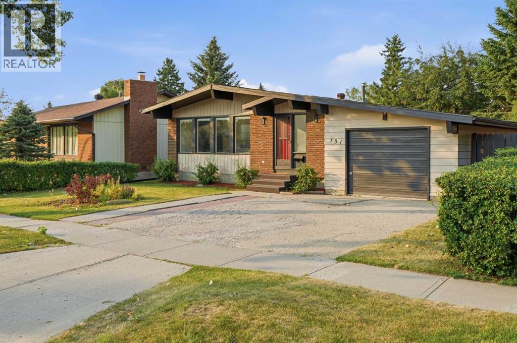 731 Queensland Drive SE, Calgary, Alberta  T2J 4S8 - Photo 3 - A2334302