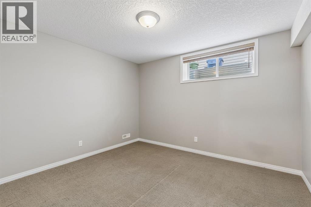 48 Rockywood Circle Nw, Calgary, Alberta  T3G 5W2 - Photo 30 - A2331048