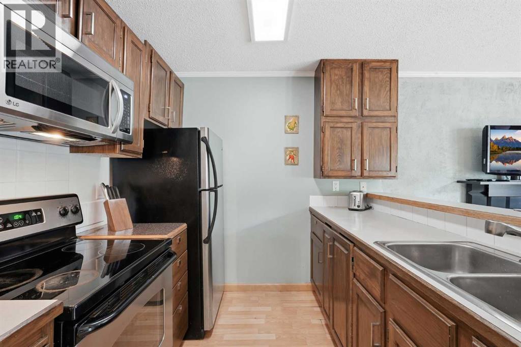 2, 97 Grier Place Ne, Calgary, Alberta  T2K 5Y5 - Photo 9 - A2320907