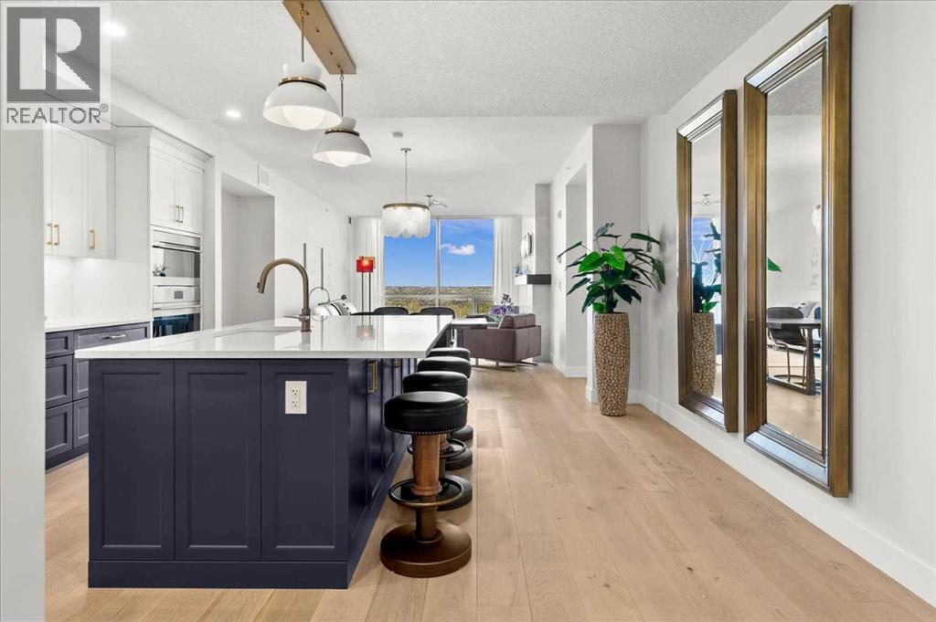 209, 15 Cougar Ridge Landing SW, Calgary, Alberta  T3H 6C3 - Photo 2 - A2317526