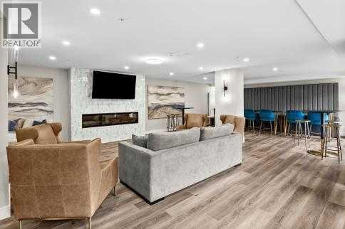209, 15 Cougar Ridge Landing SW, Calgary, Alberta  T3H 6C3 - Photo 35 - A2317526