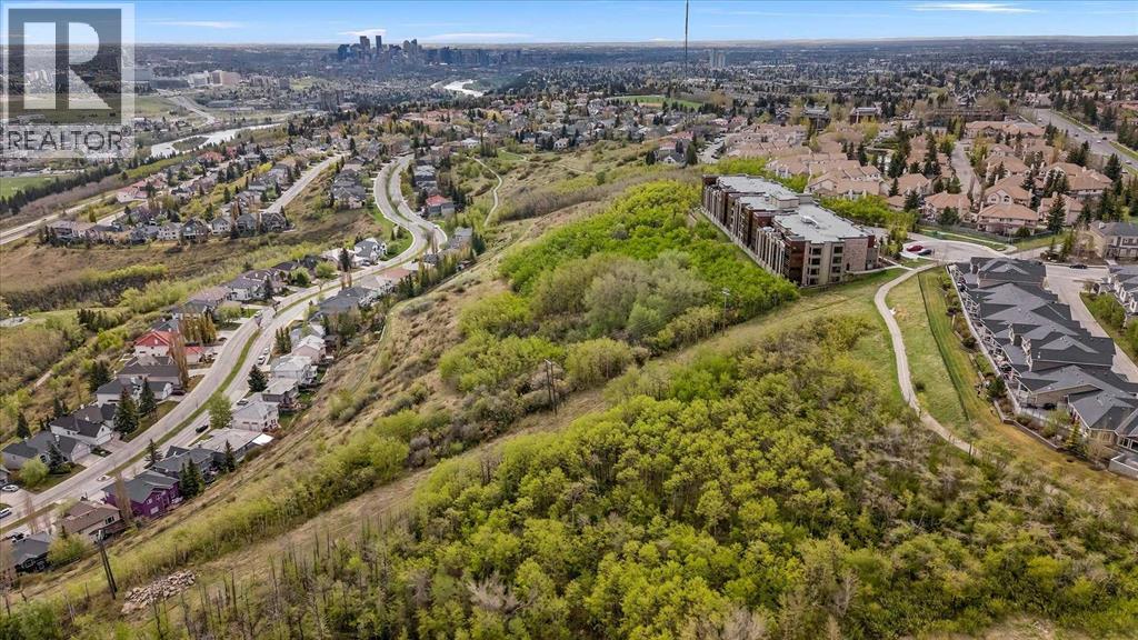 209, 15 Cougar Ridge Landing SW, Calgary, Alberta  T3H 6C3 - Photo 49 - A2317526