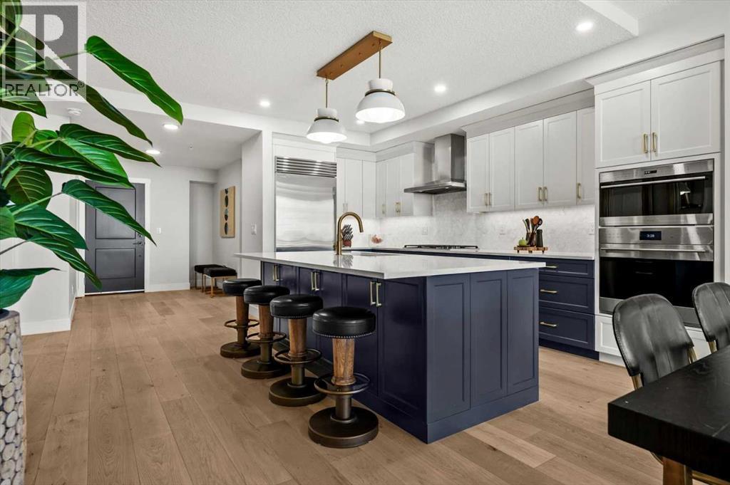 209, 15 Cougar Ridge Landing SW, Calgary, Alberta  T3H 6C3 - Photo 3 - A2317526