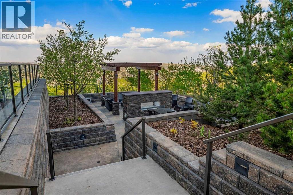 209, 15 Cougar Ridge Landing SW, Calgary, Alberta  T3H 6C3 - Photo 42 - A2317526