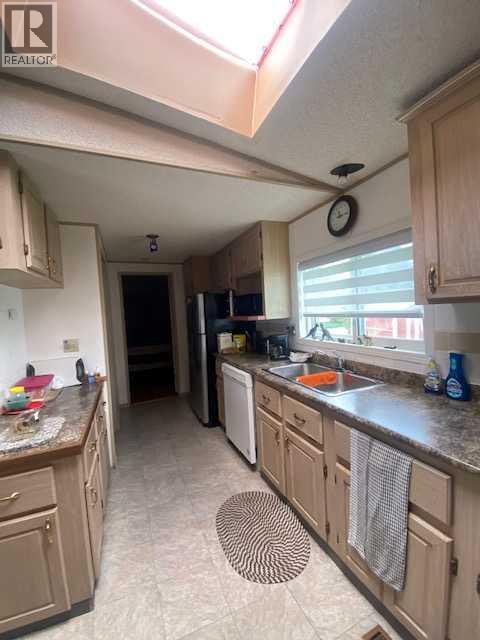 30 Lake Stafford Crescent E, Brooks, Alberta  T1R 0P5 - Photo 4 - A2317990