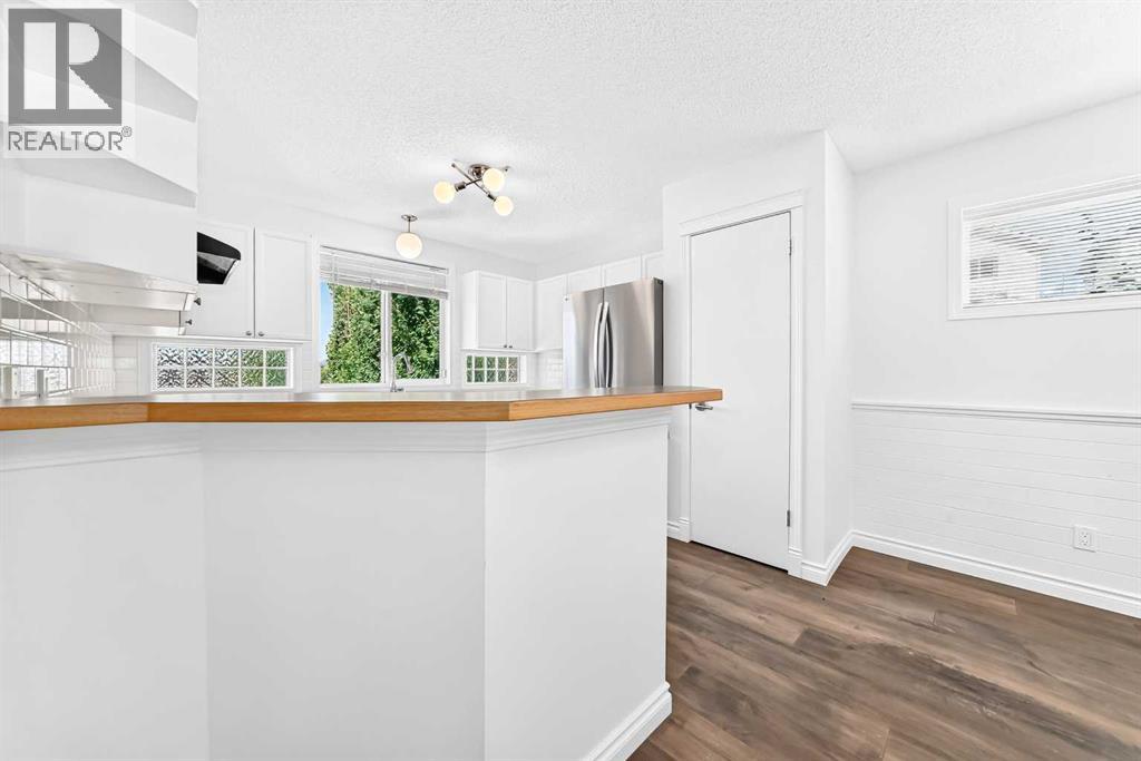 708 Tuscany Drive NW, Calgary, Alberta  T3L 3A7 - Photo 7 - A2333663