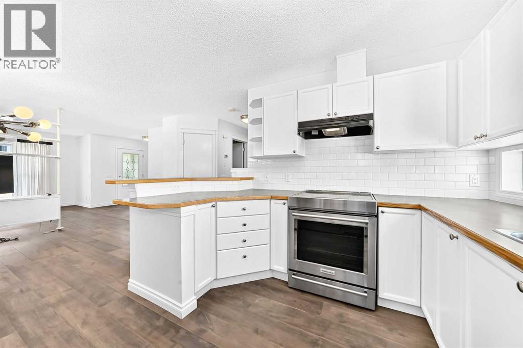 708 Tuscany Drive NW, Calgary, Alberta  T3L 3A7 - Photo 4 - A2333663
