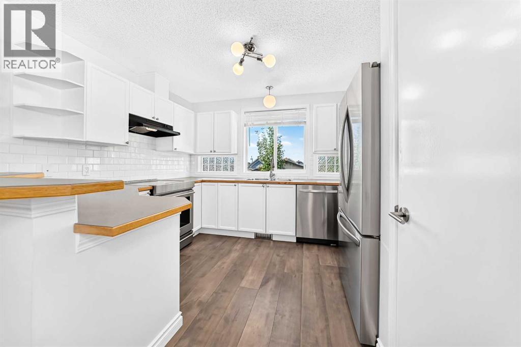708 Tuscany Drive NW, Calgary, Alberta  T3L 3A7 - Photo 6 - A2333663
