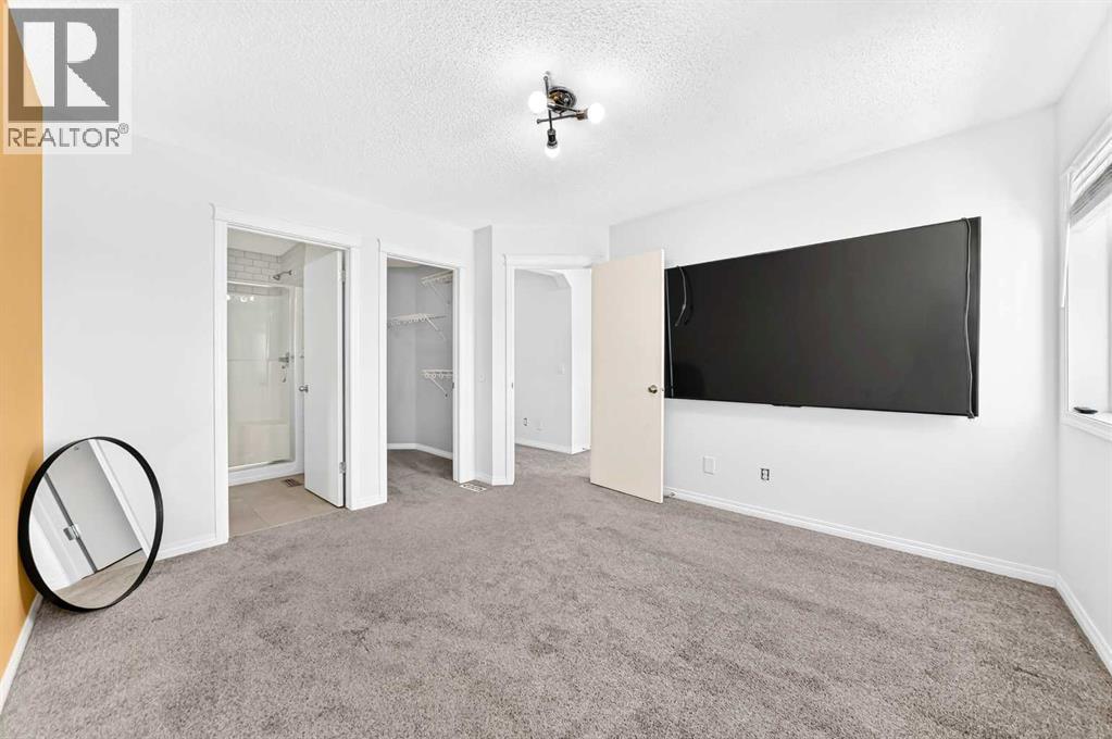 708 Tuscany Drive NW, Calgary, Alberta  T3L 3A7 - Photo 18 - A2333663