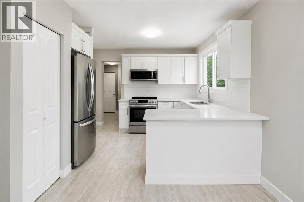 115 Abingdon Crescent NE, Calgary, Alberta  T2A 6W8 - Photo 5 - A2334535