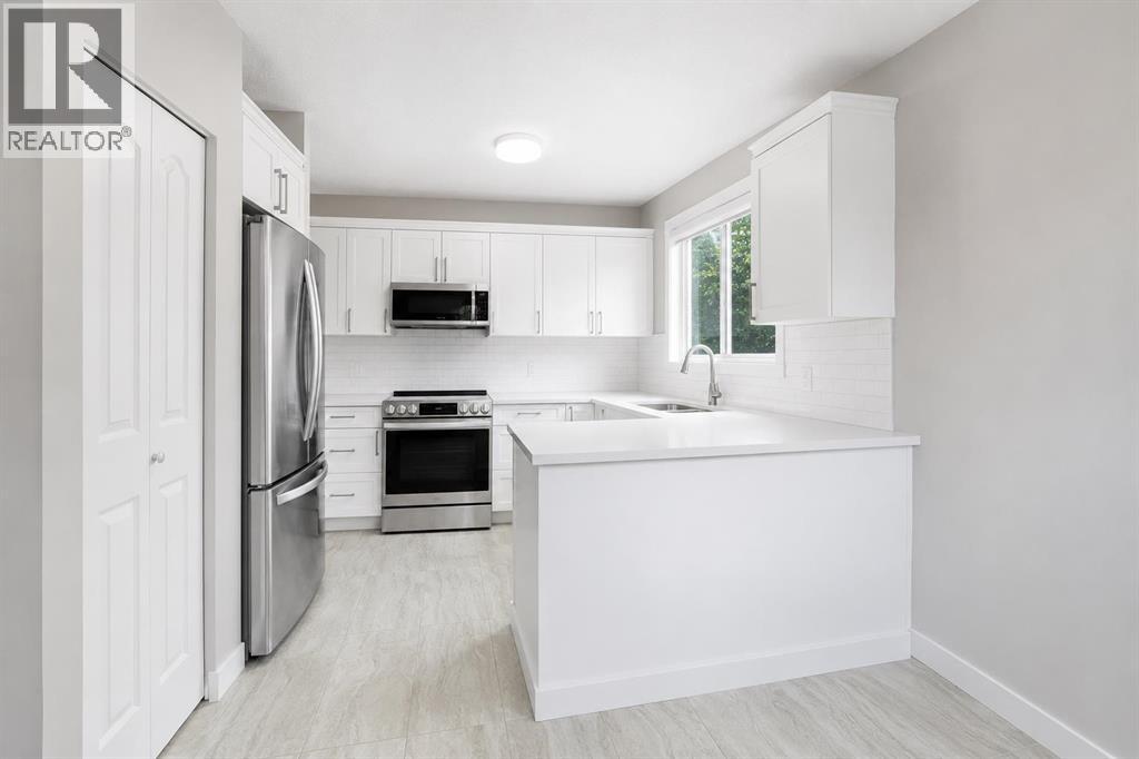 115 Abingdon Crescent NE, Calgary, Alberta  T2A 6W8 - Photo 6 - A2334535