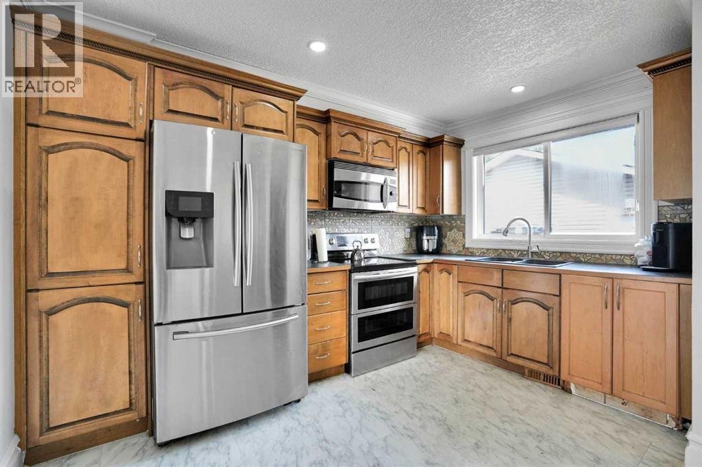 212 Pinetree Place NE, Calgary, Alberta  T1Y 1M3 - Photo 12 - A2330861
