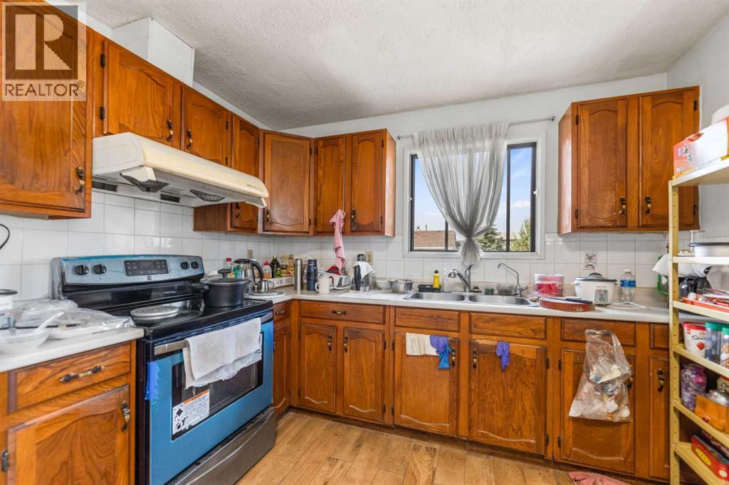 6772 Temple Drive NE, Calgary, Alberta  T1Y 5E6 - Photo 5 - A2333375