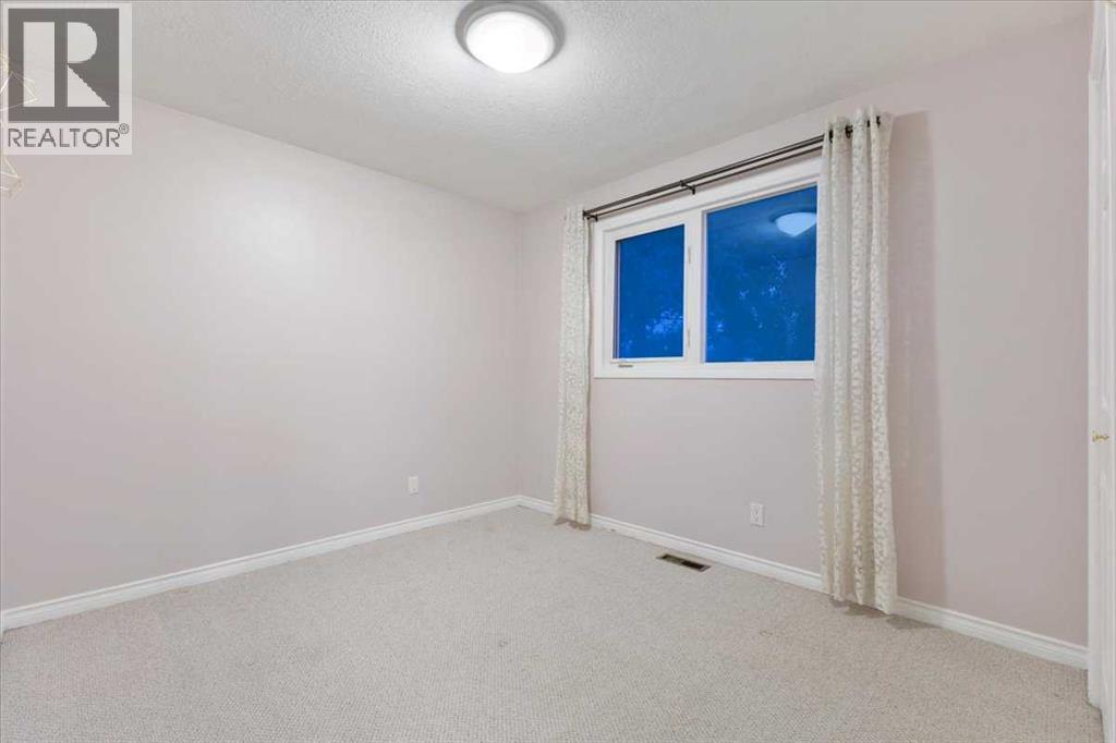 124 Oakmoor Place SW, Calgary, Alberta  T2V 4A3 - Photo 23 - A2334613