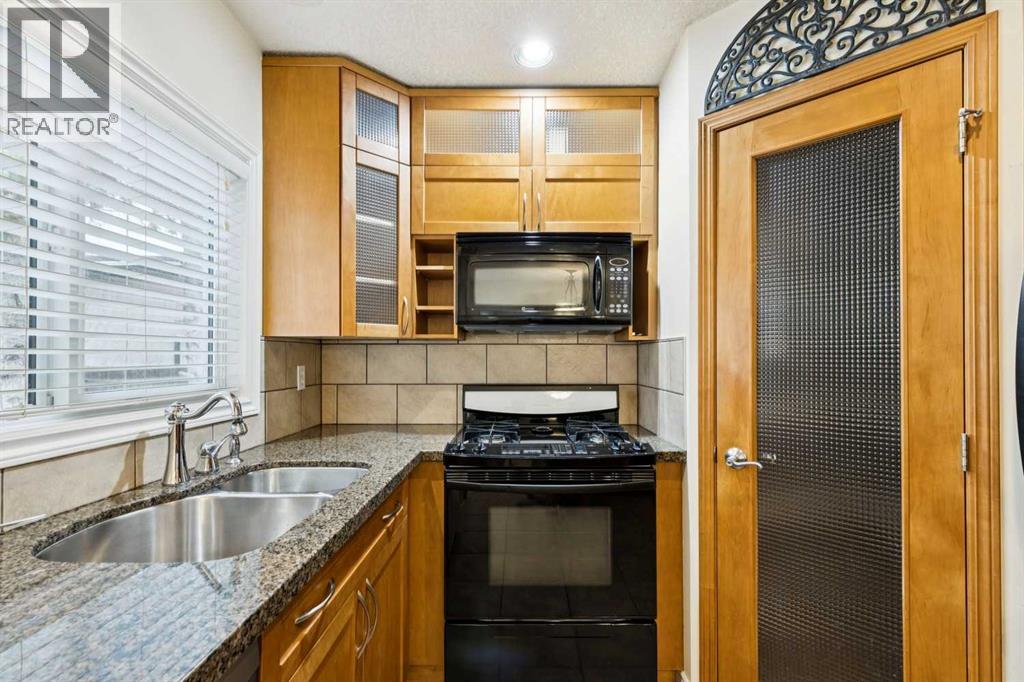 7615 36 Avenue NW, Calgary, Alberta  T3B 1V2 - Photo 7 - A2308209