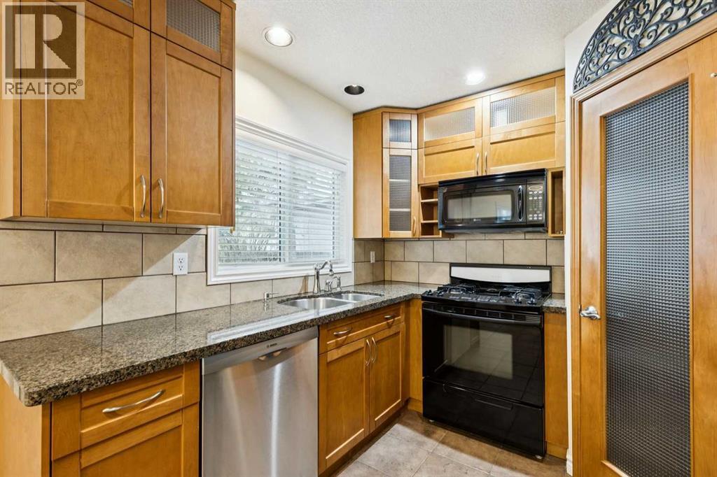 7615 36 Avenue NW, Calgary, Alberta  T3B 1V2 - Photo 5 - A2308209