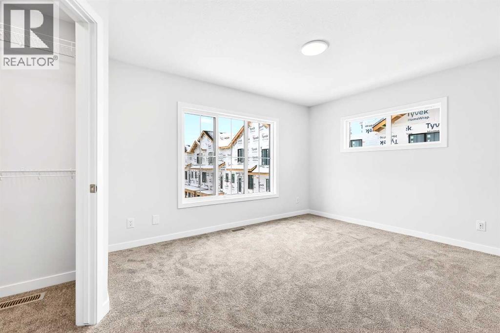 302, 40 Creekside Way SW, Calgary, Alberta  T2X 6E2 - Photo 21 - A2334887