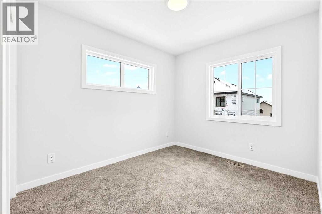 302, 40 Creekside Way SW, Calgary, Alberta  T2X 6E2 - Photo 25 - A2334887