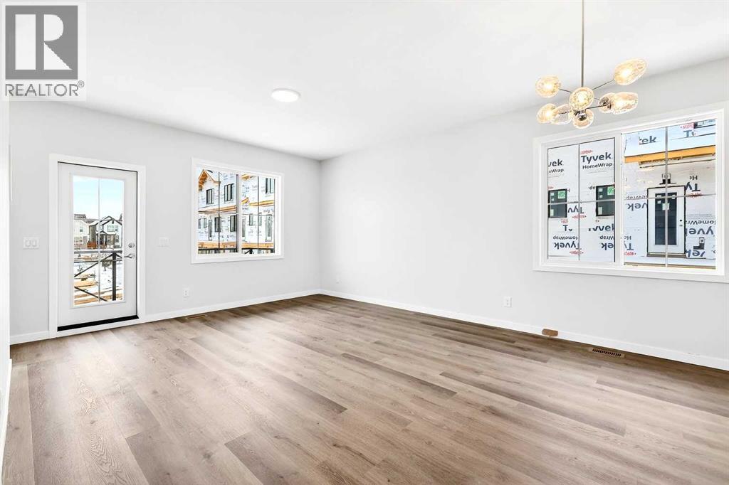 302, 40 Creekside Way SW, Calgary, Alberta  T2X 6E2 - Photo 8 - A2334887