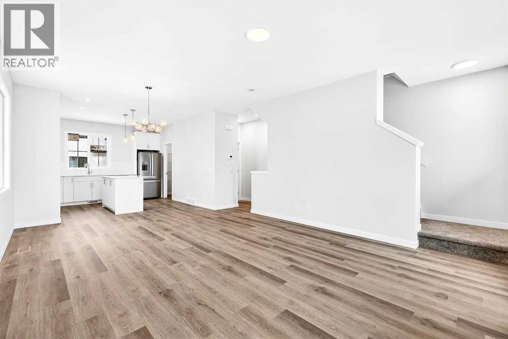 302, 40 Creekside Way SW, Calgary, Alberta  T2X 6E2 - Photo 9 - A2334887
