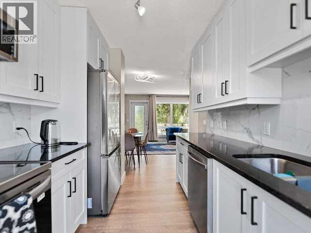 416 Covecreek Circle NE, Calgary, Alberta  T3K 0W6 - Photo 6 - A2319946