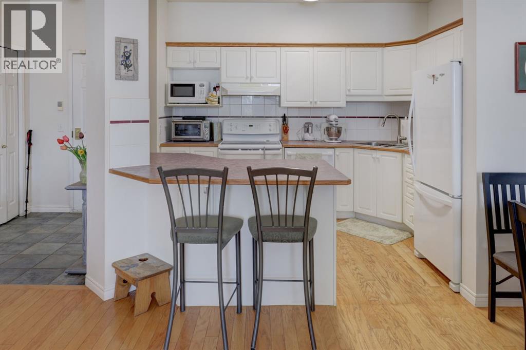 105, 4835 Dalhousie Drive NW, Calgary, Alberta  T3A 5R7 - Photo 4 - A2313346