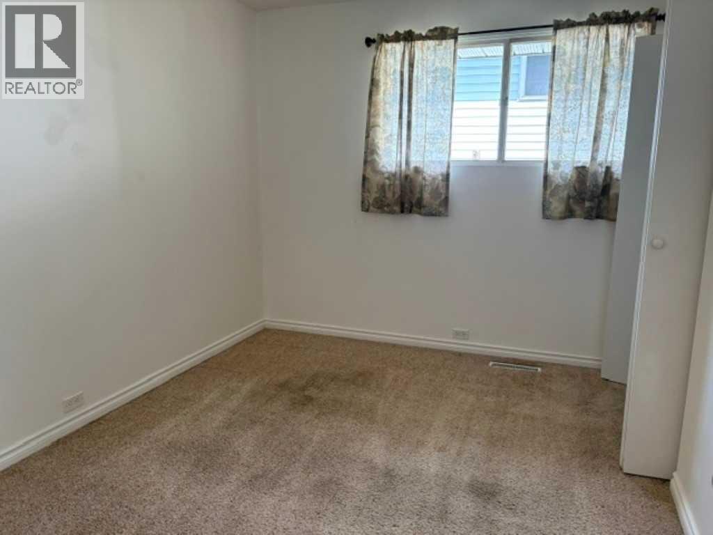 715 64 Avenue NW, Calgary, Alberta  T2K 0M3 - Photo 10 - A2332748