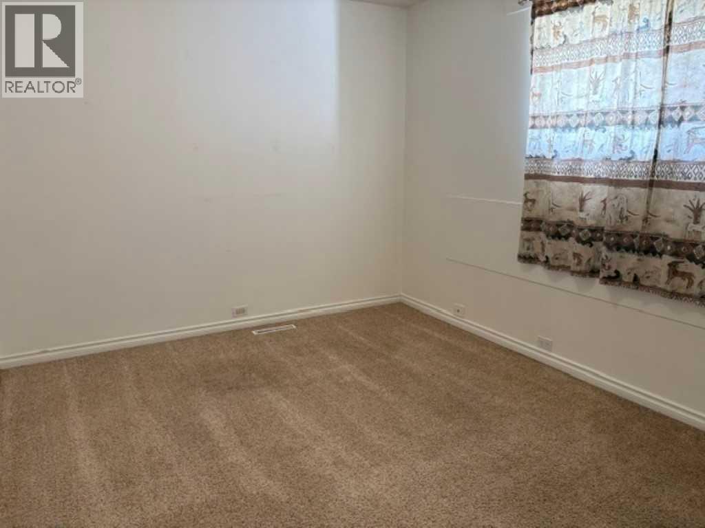 715 64 Avenue NW, Calgary, Alberta  T2K 0M3 - Photo 13 - A2332748