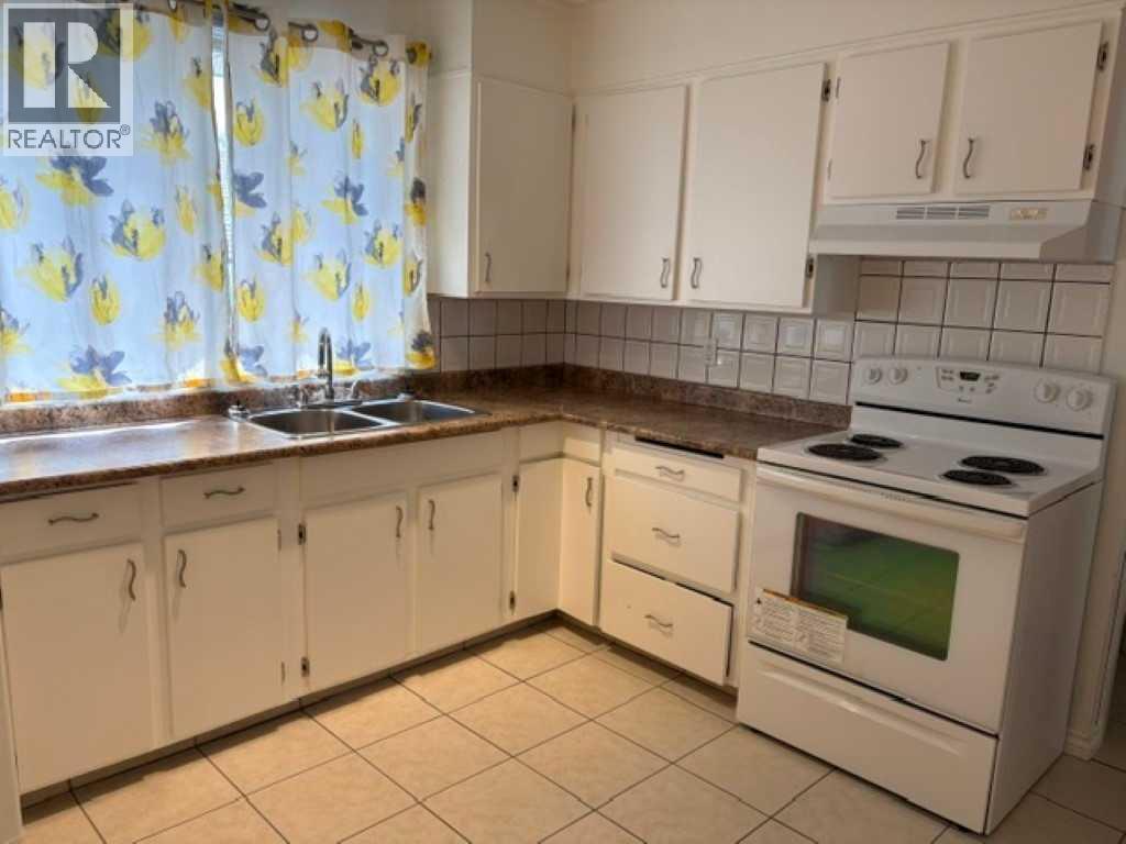 715 64 Avenue NW, Calgary, Alberta  T2K 0M3 - Photo 9 - A2332748