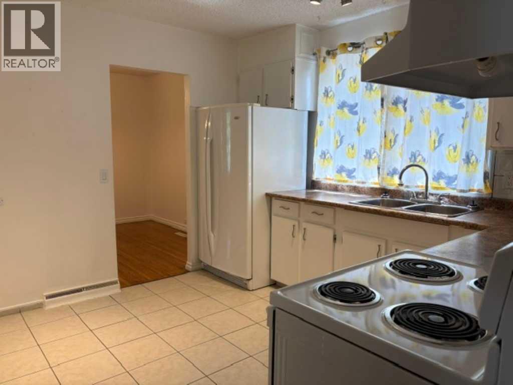 715 64 Avenue NW, Calgary, Alberta  T2K 0M3 - Photo 8 - A2332748