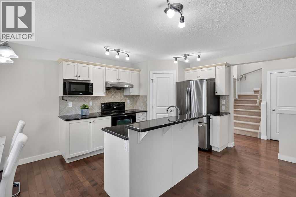 230 Evermeadow Avenue SW, Calgary, Alberta  T2Y 4X2 - Photo 8 - A2333381