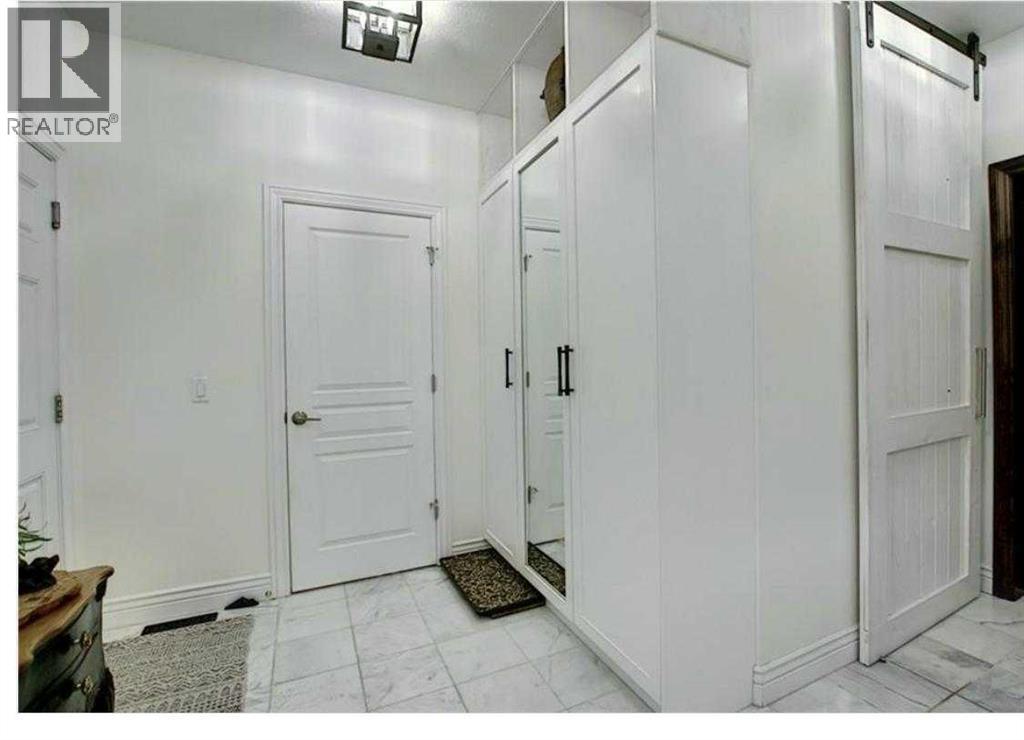 210 Panatella Heath NW, Calgary, Alberta  t3k 0h3 - Photo 31 - A2333335
