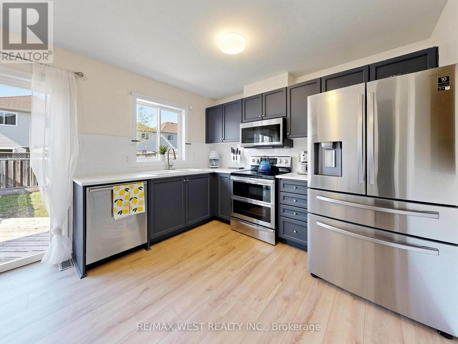 195 Banting Crescent, Essa, Ontario  L0M 1B6 - Photo 3 - N13642274