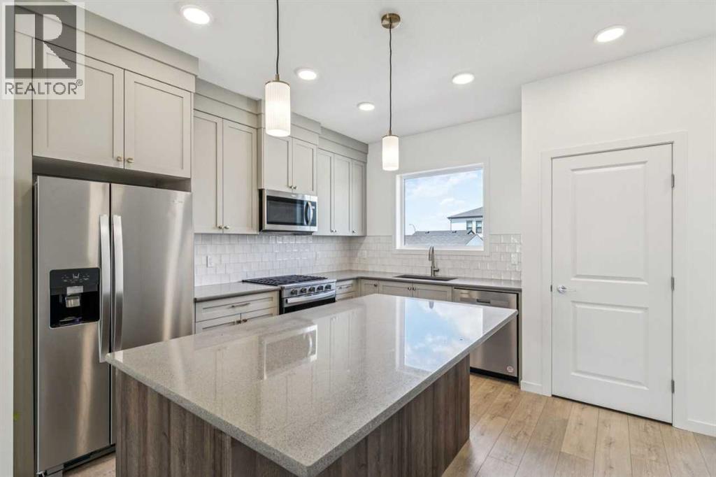 37 Bluerock Hill SW, Calgary, Alberta  T2Y 0V8 - Photo 10 - A2332885